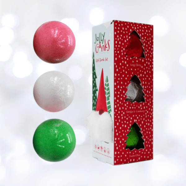 Image of 3 round bath bombs, one green, one red and one white