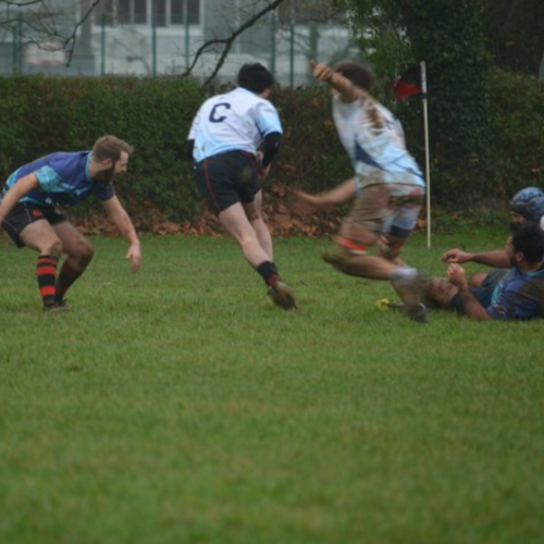 Photograph of rugby players playing rugby